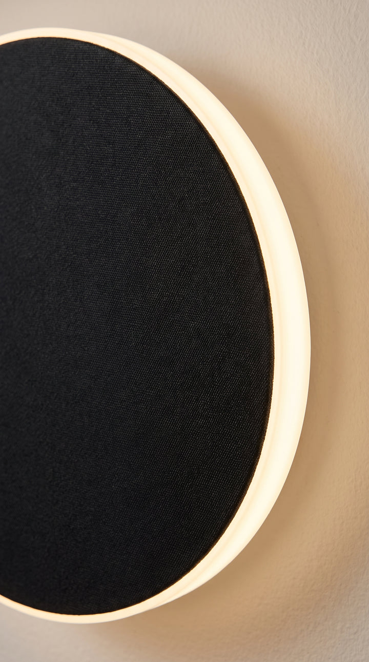 Round LED Wall Sconce for a Warmer, Calmer Home