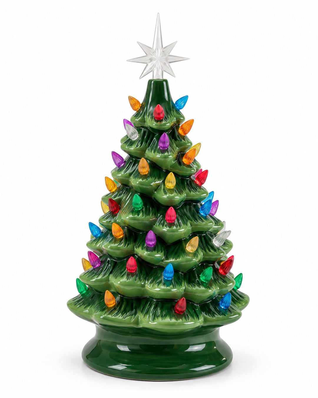 Green ceramic Christmas tree with multicolour bulbs and a clear star on a white background