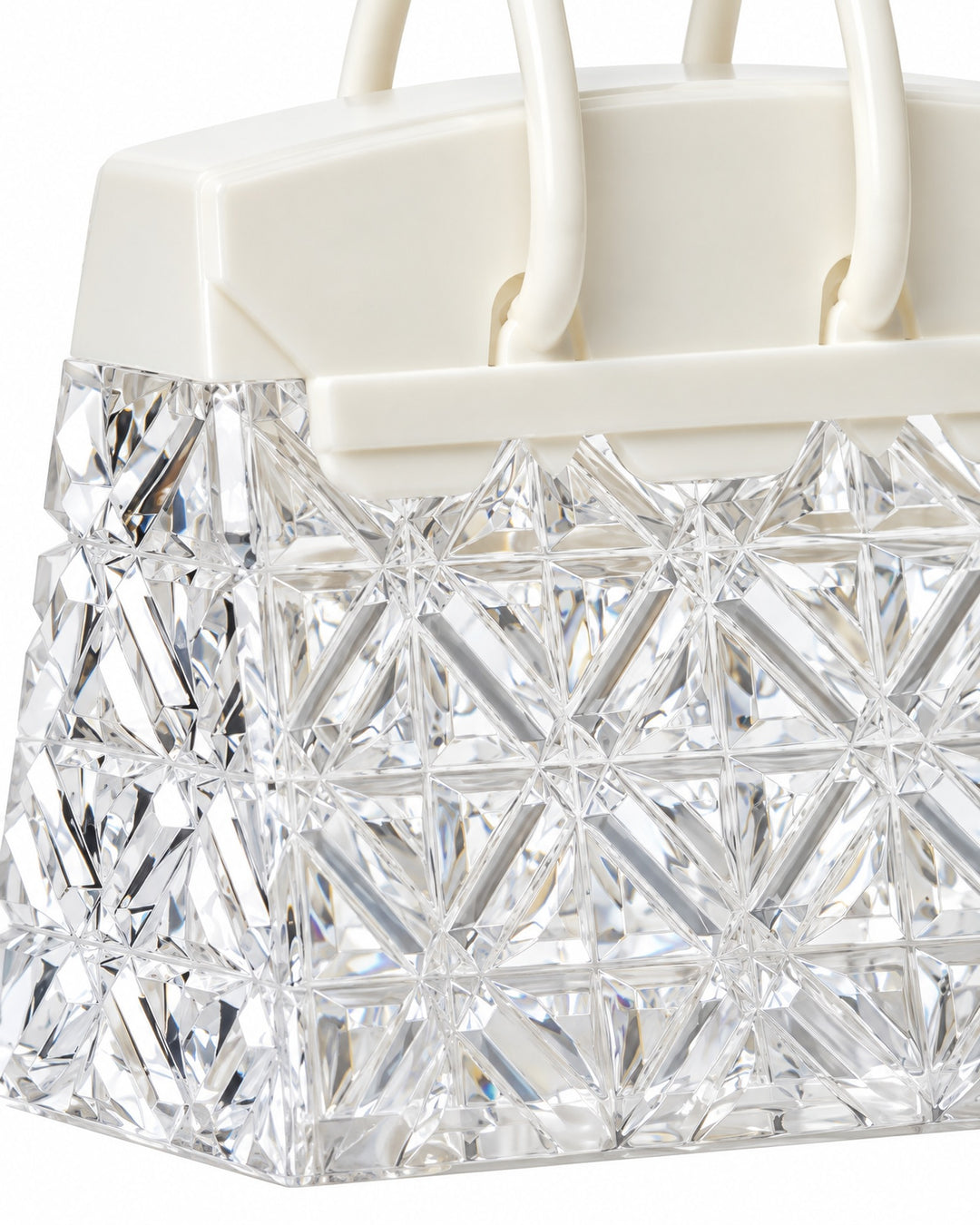 Close-up of the faceted clear body and the white top of the handbag night light