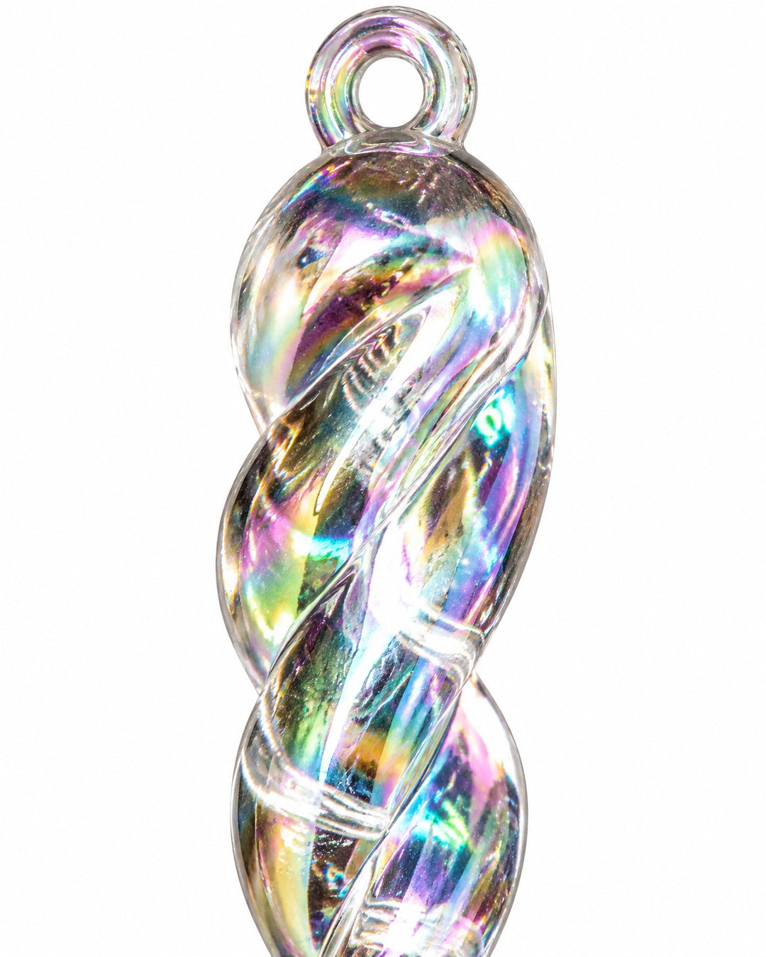 Close-up of a twisted iridescent icicle with rainbow reflections