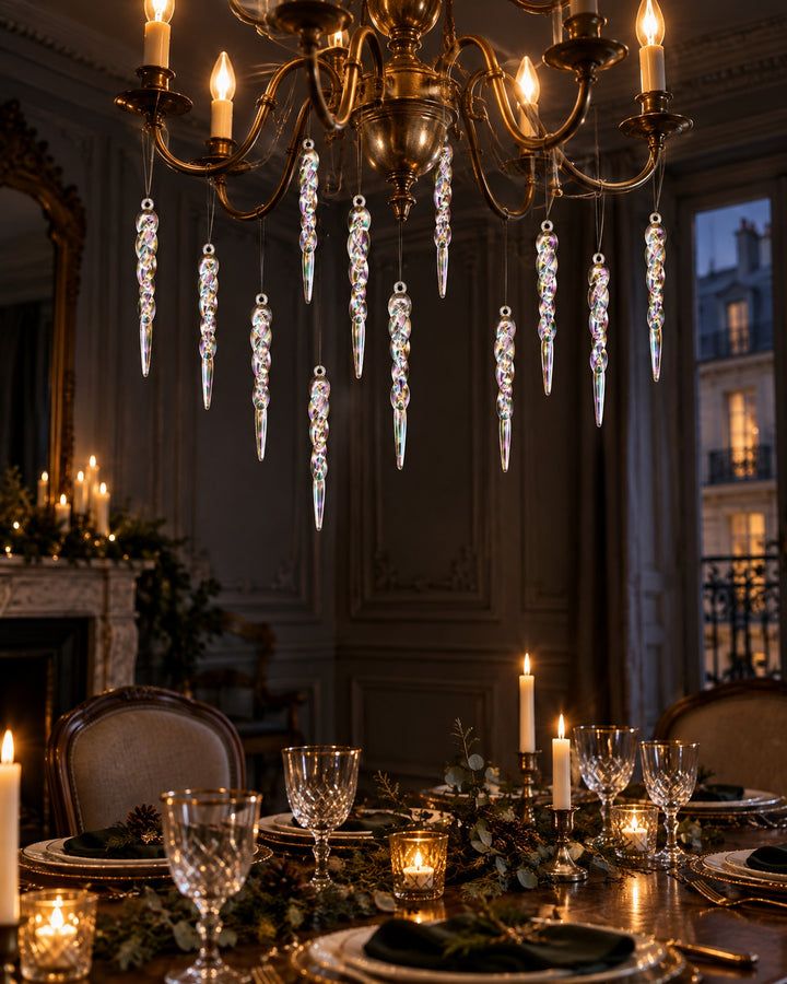 Iridescent icicle ornaments hanging from a brass chandelier over a dining table