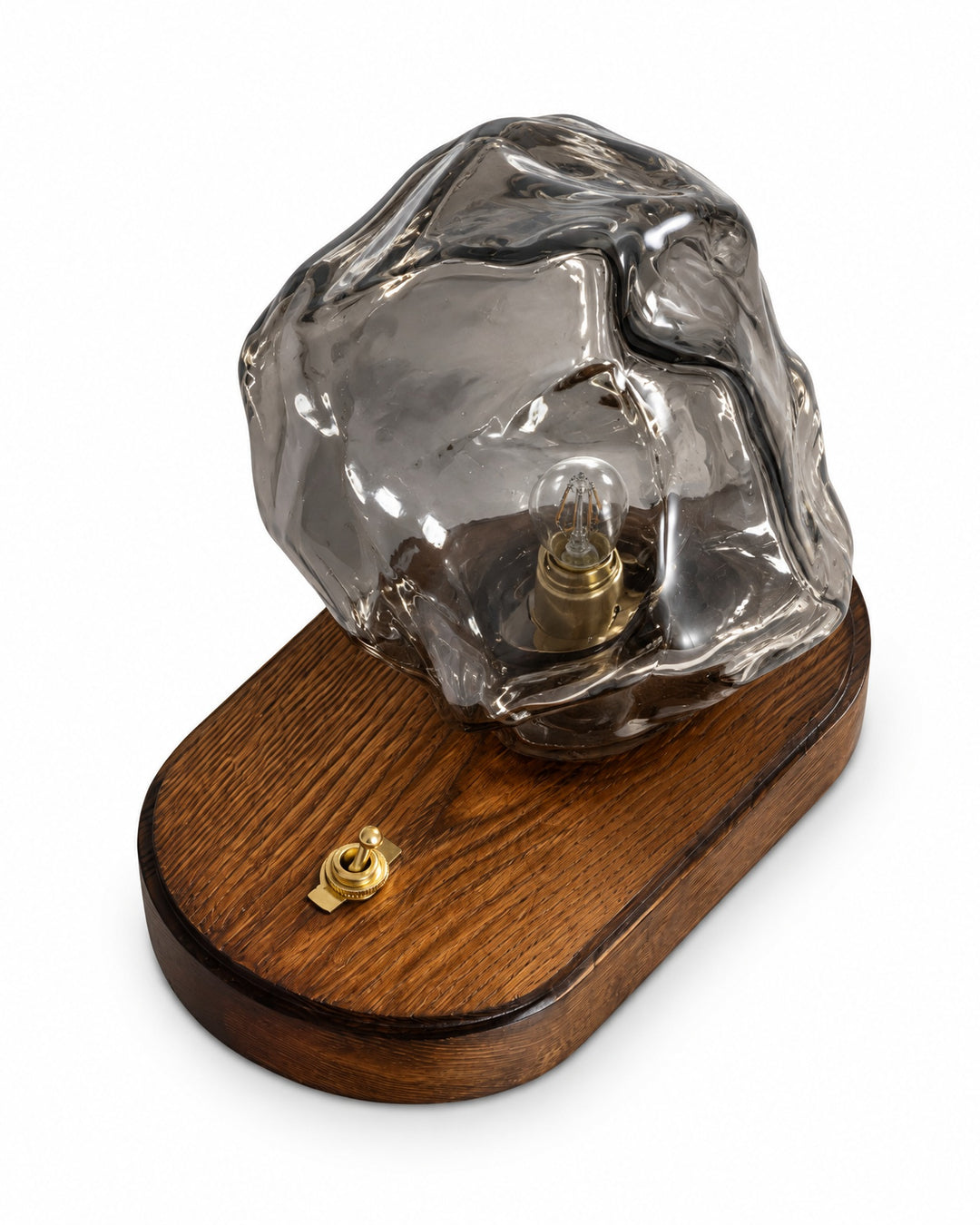Grey ice rock glass lamp seen from above with its oval base