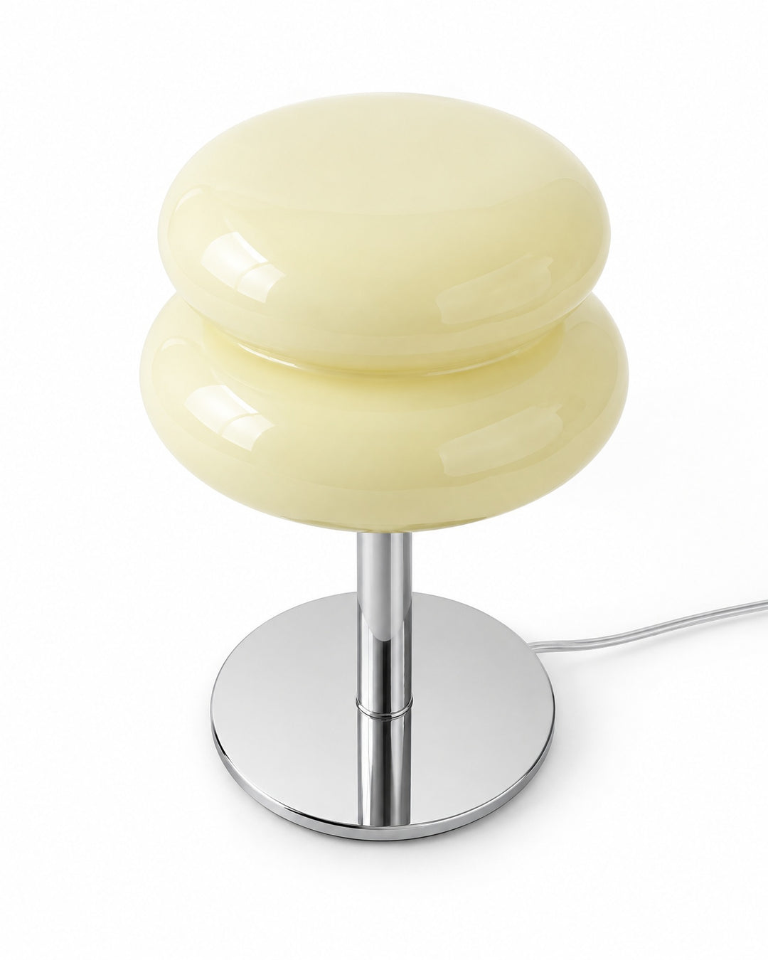 Cream macaron glass lamp seen from above on a white background