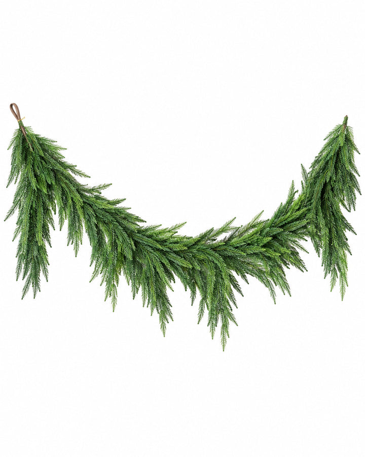 1.8 m Norfolk pine-style garland hanging in a soft swag with its brown loop, on a white background