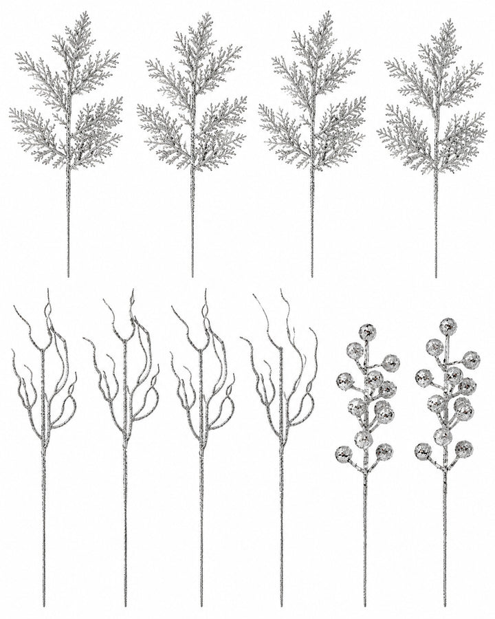 Silver glitter pine, twig and berry stems laid flat, seen from above
