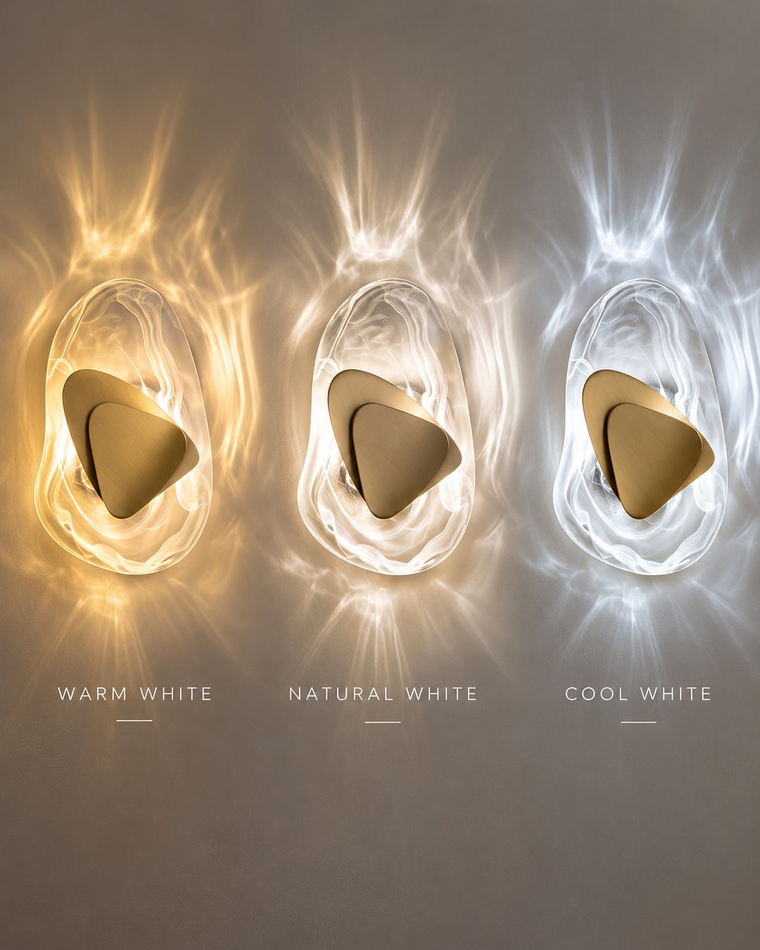 Three gold Ripple glass wall lights side by side in warm white, natural white and cool white light