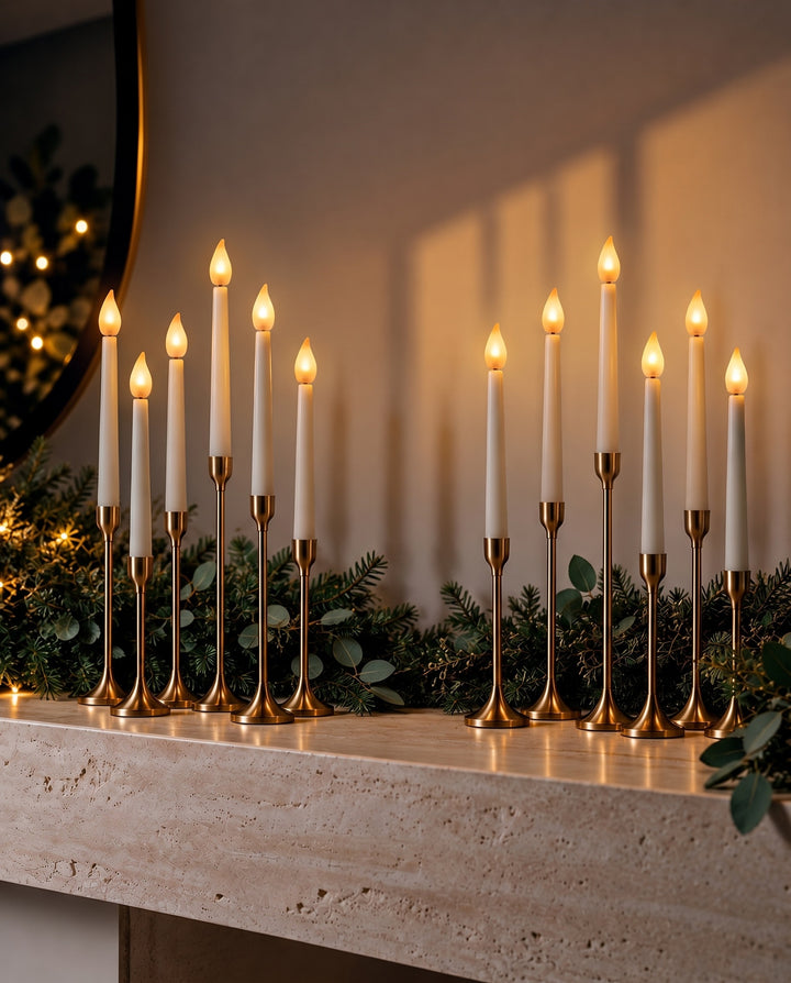 Twelve ivory flameless LED taper candles in two groups of six, glowing in brass candlesticks on a travertine mantel